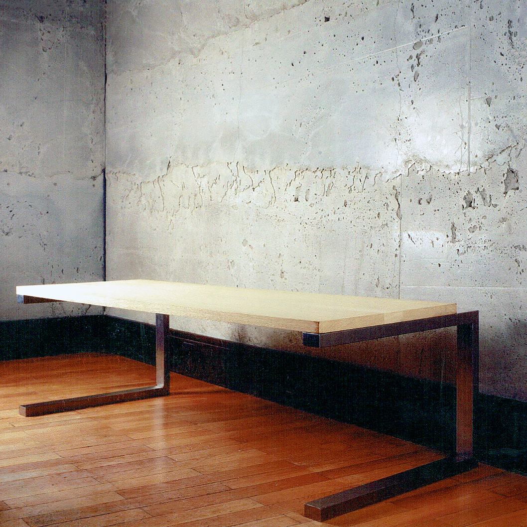 Long Table: Oak and Stainless Steel: Polished Concrete Wall