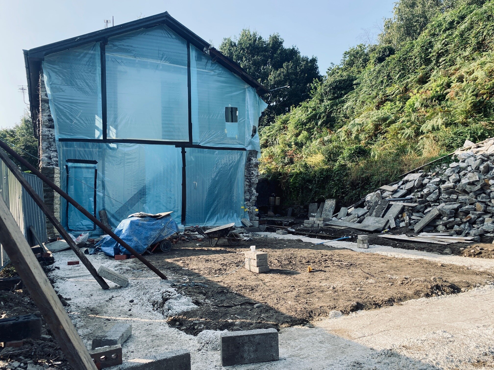 The demolition has begun on a beautiful stone cottage near Castell Coch. A contemporary weathered steel, glass and stone extension will soon grow from the ground