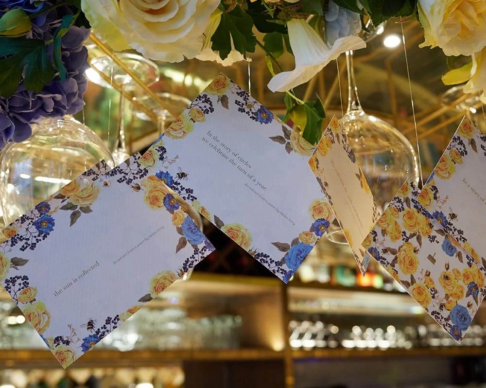Beautiful poems by Helen Ivory, suspended at the bar