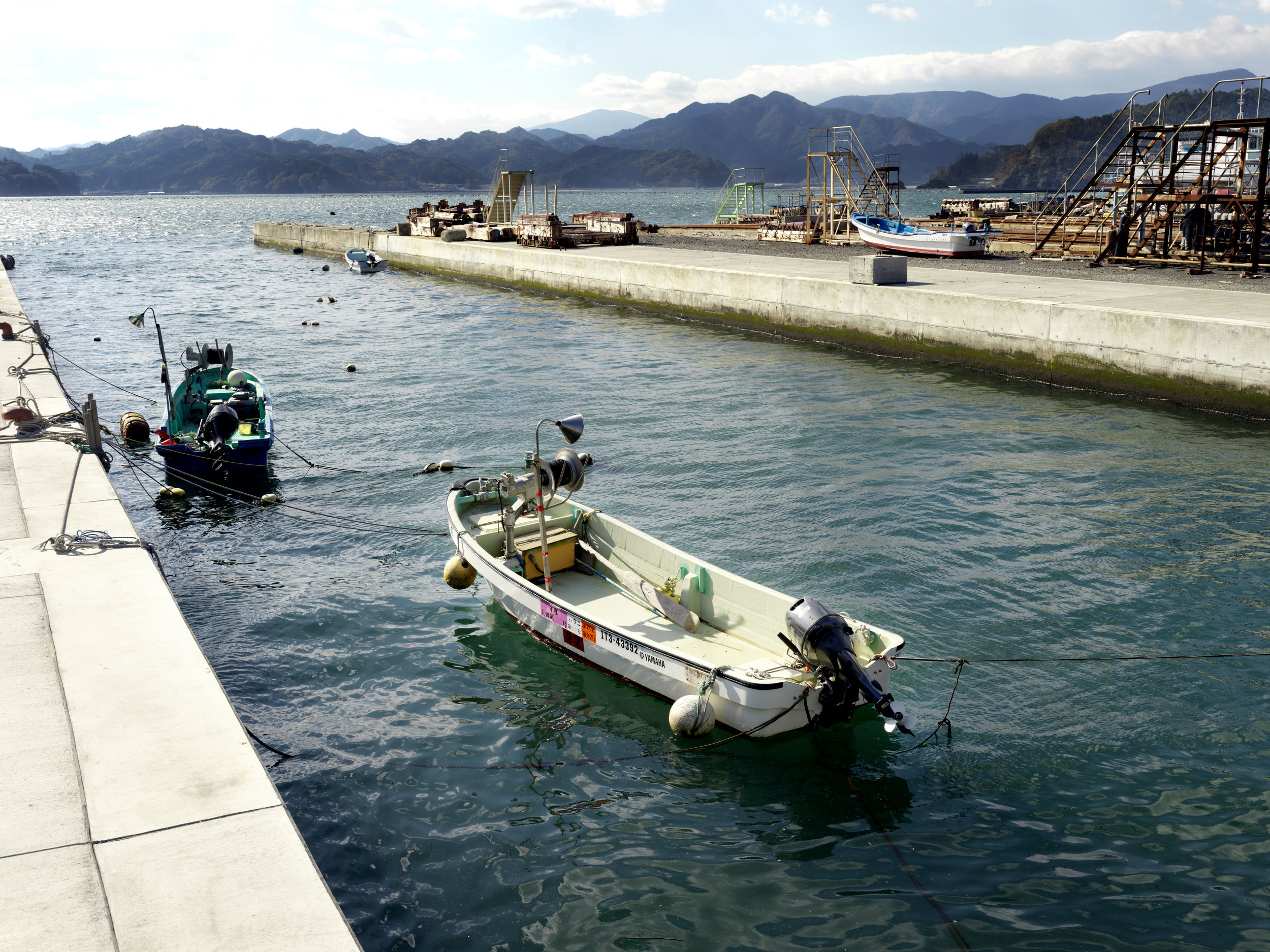  Otsuchi, a town whose income relies heavily on the fishing provided by the spoils of the Pacific Ocean, had its harbours and ports totally wiped out by the Tsunami of 2011. 