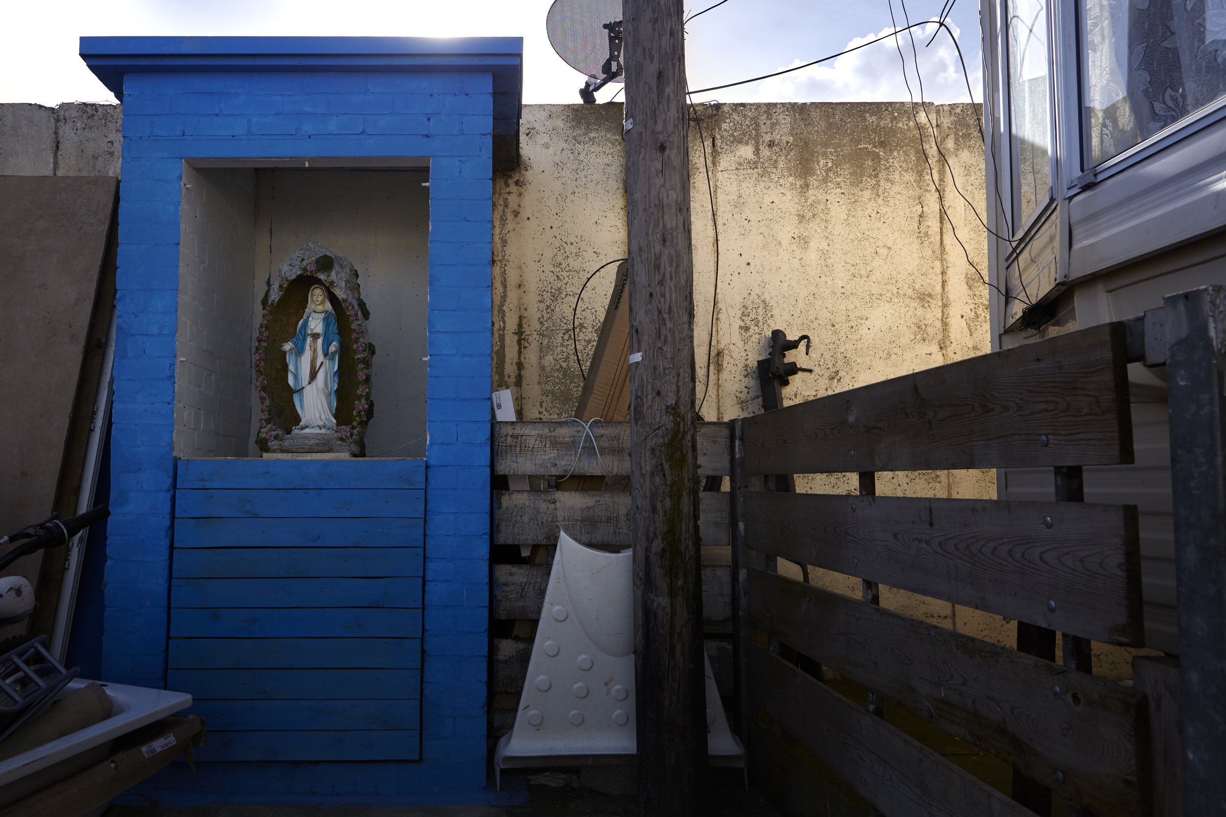 A shrine to the Virgin Mary sits at the far end of the Westway site. “I was born catholic and I’ll die catholic: there’s nothing you can do to change my religion. Same as my heritage: born a traveller, I’ll die a traveller. So I don’t think anyone should force something else down our throat.”