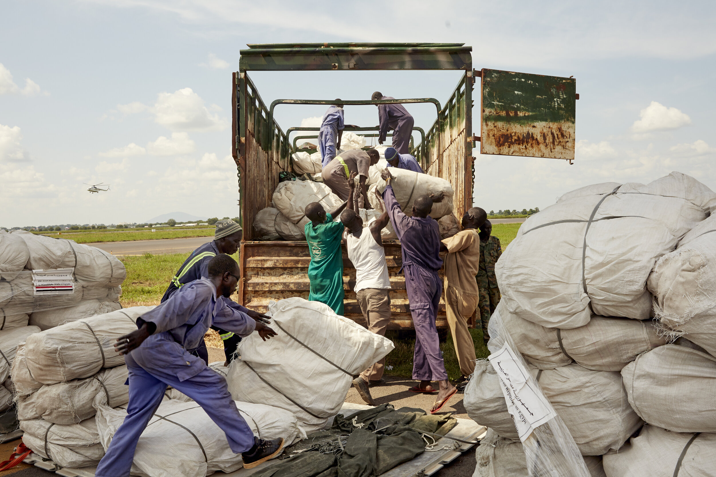 Airport workers load a lorry at Juba International Airport in Juba, South Sudan