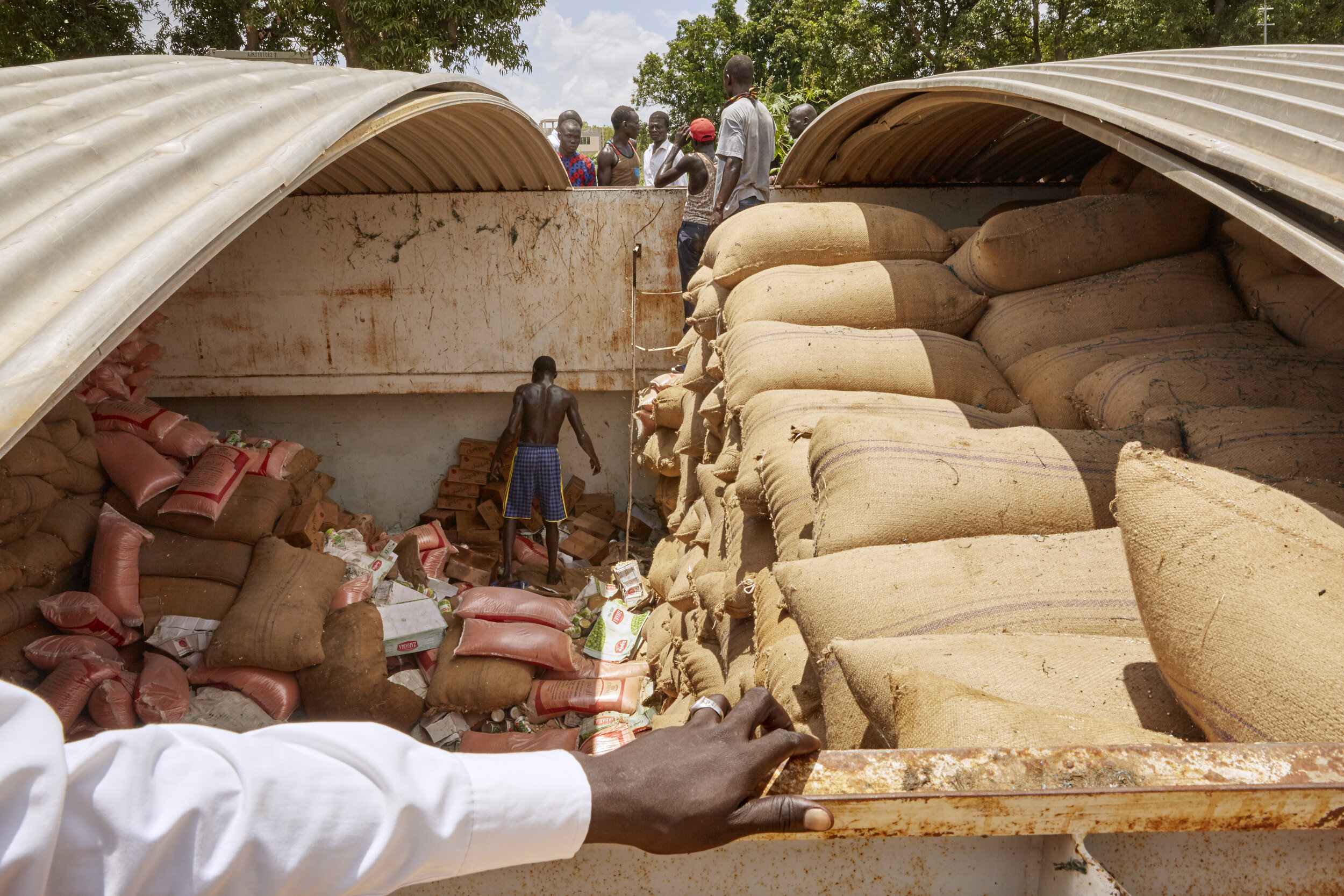 Military food supplies are stored in a barge in Juba, South Sudan