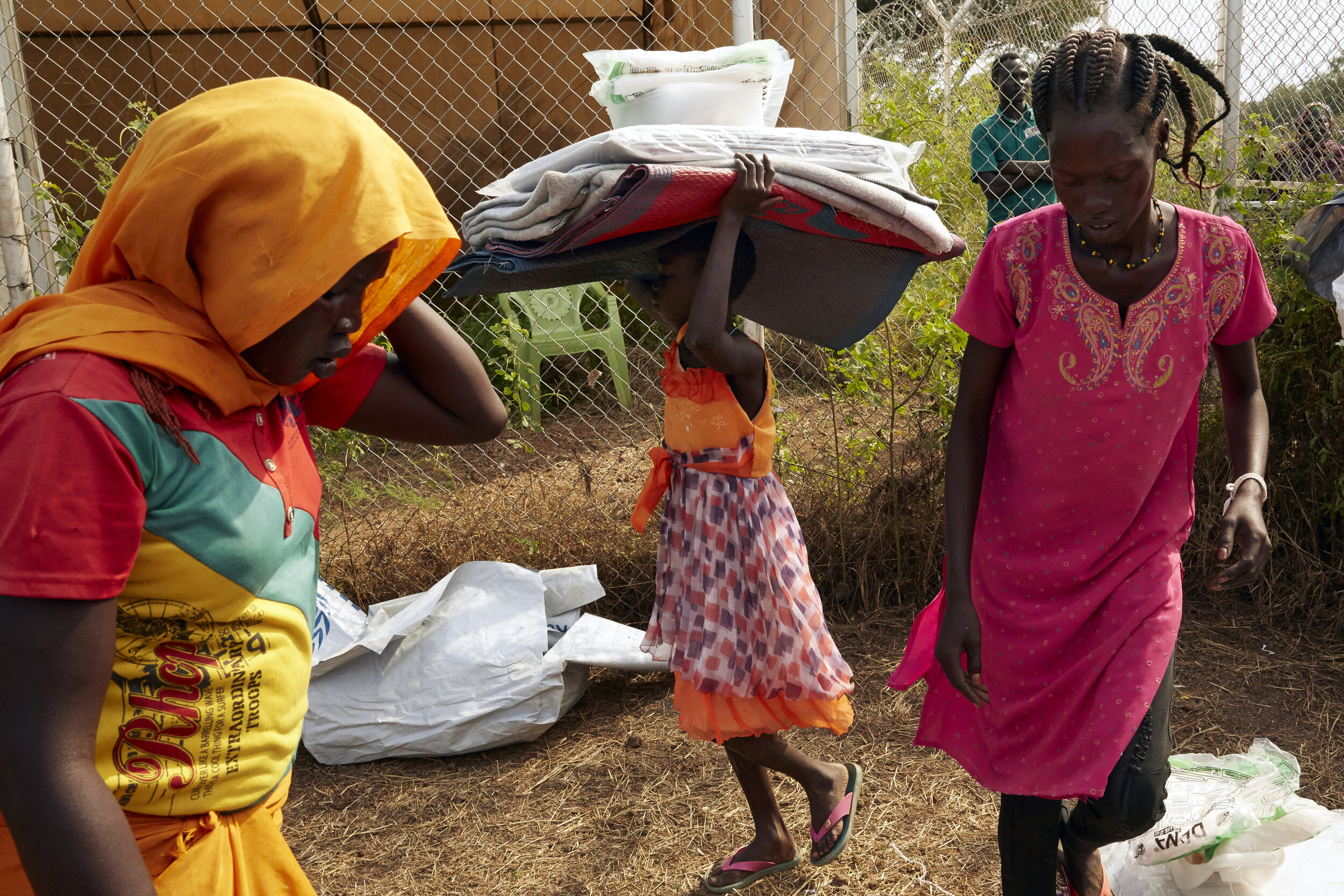 Villagers collect aid items in Maban, South Sudan