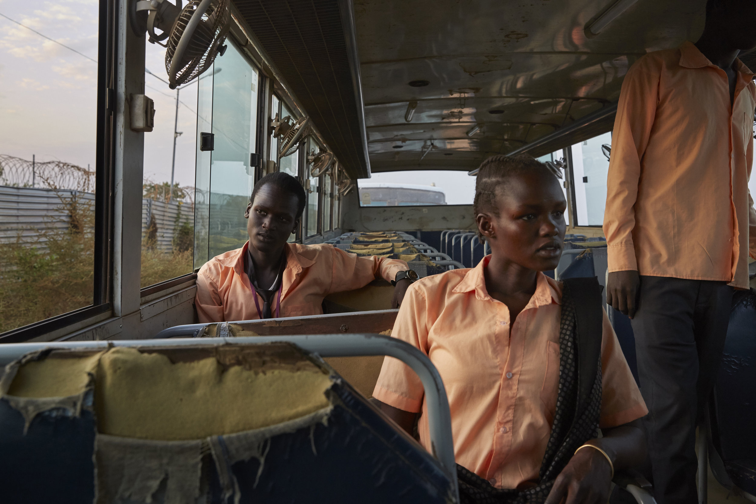 South Sudanese students sit on a school bus in Juba, South Sudan