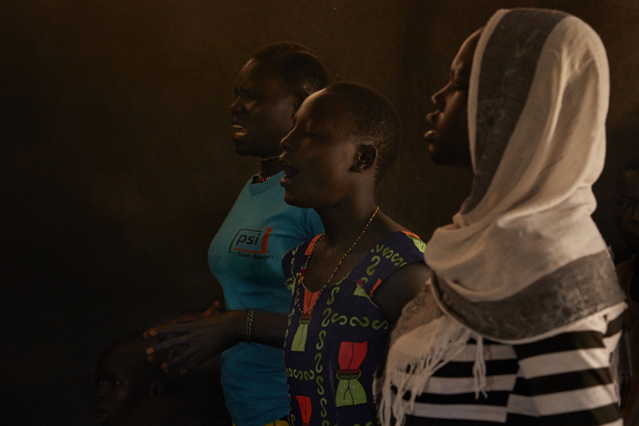 The wives and relatives of soldiers sing hymns in a church in Yei, South Sudan