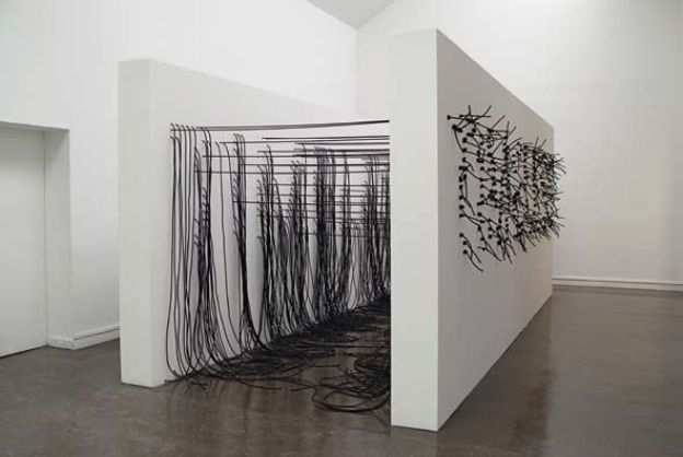 mgodinho, Timeless, 2009, two wood walls, acrylc paint, black elastic rope, 250 x 250 x 650cm, sapar contemporary.jpg