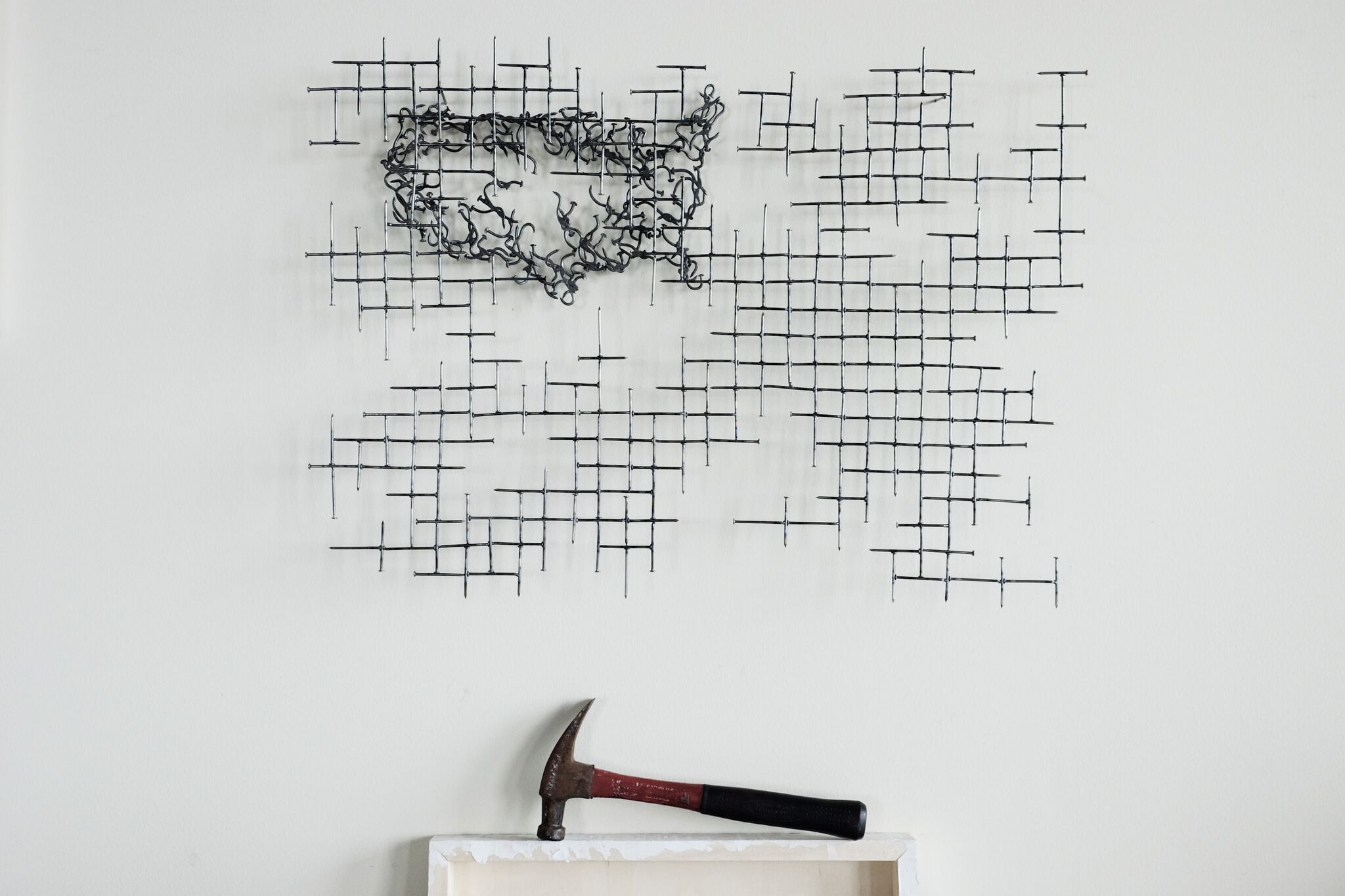 USA behind tattered grid hammer.jpg