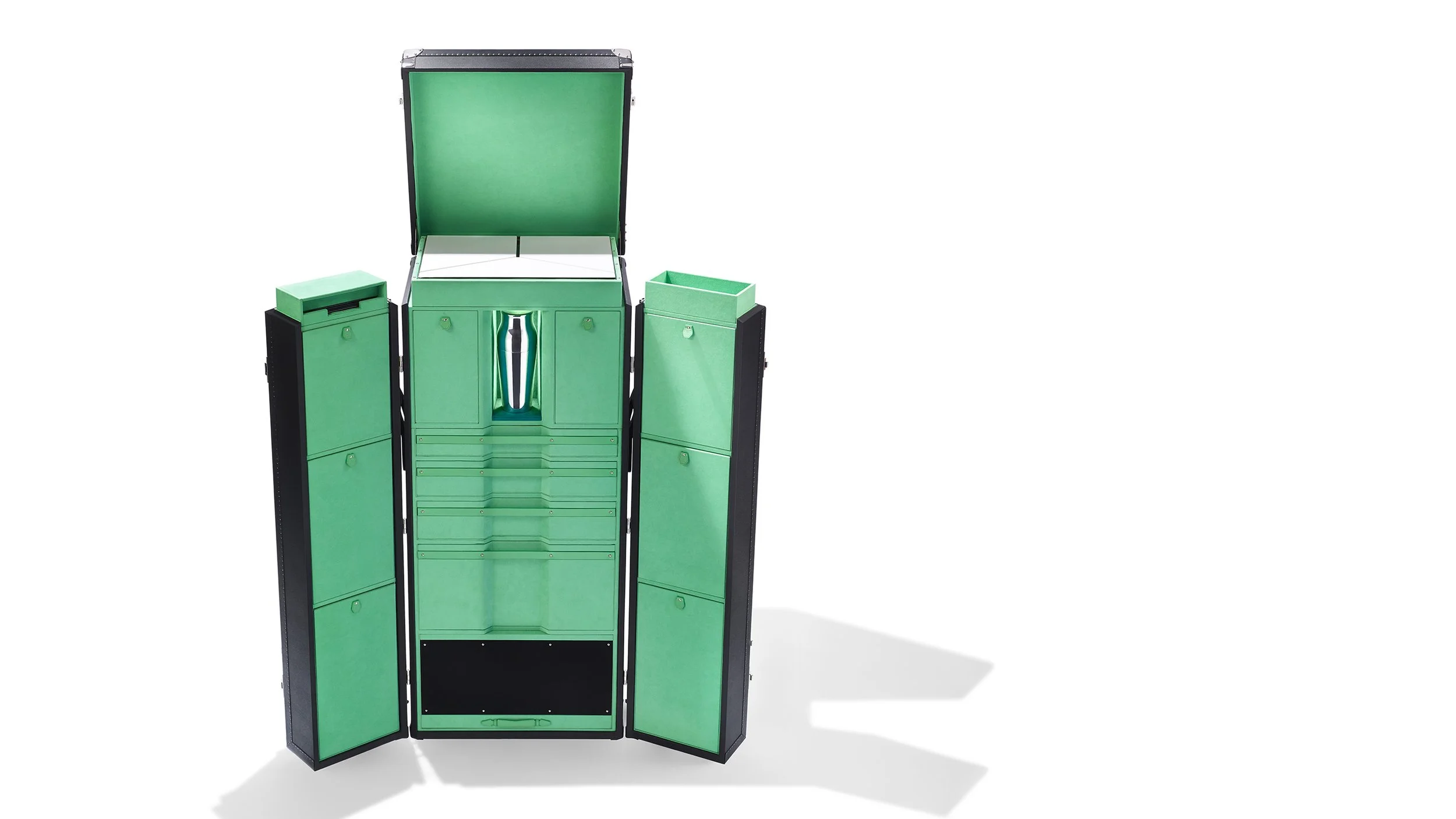 Malle à cocktails T512 Mojito en cuir Céladon, plateau Corian et accessoires de bar