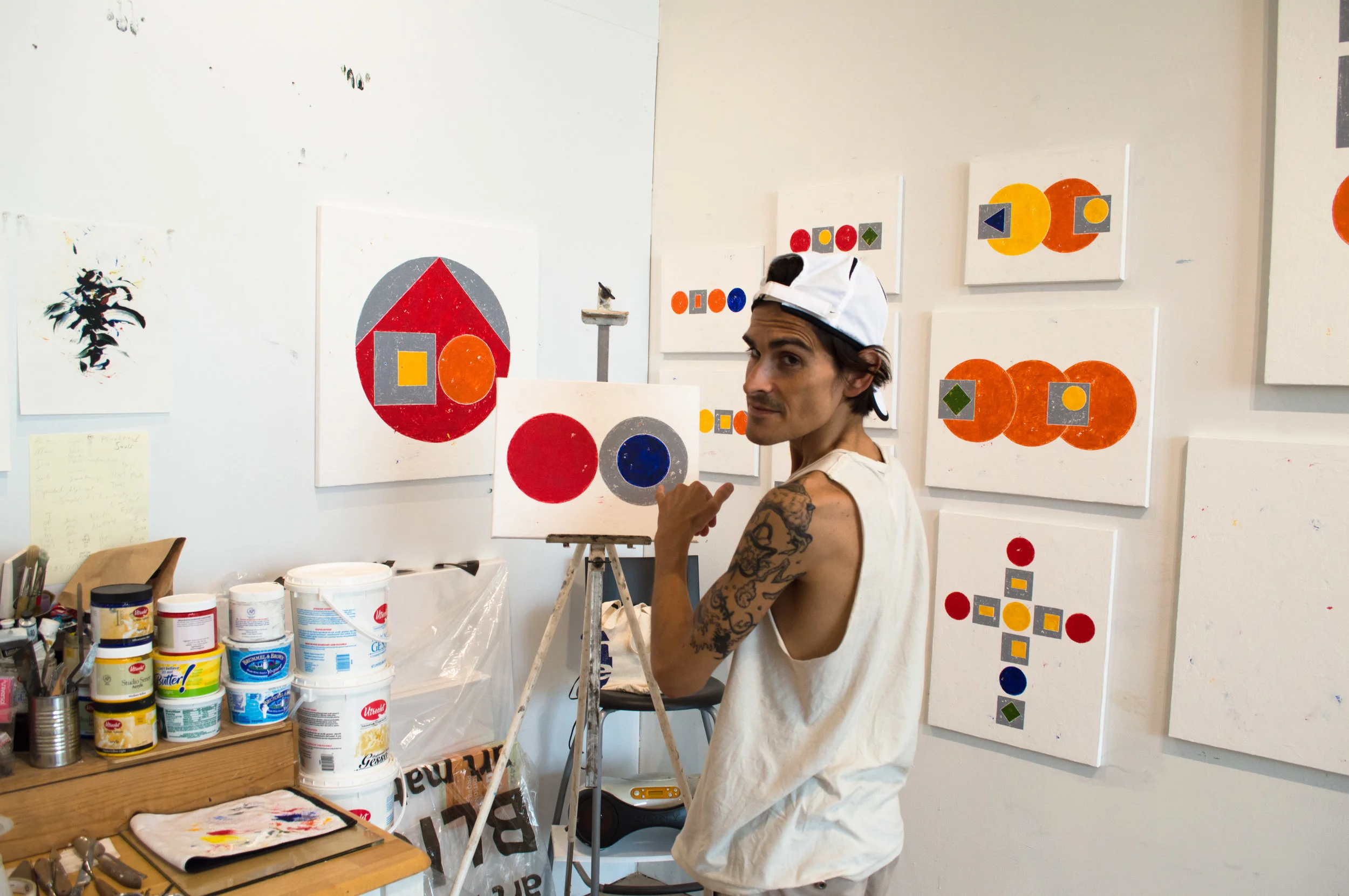 Discussing paintings at 56 Bogart
