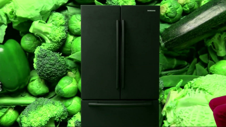 Mark Leckey, GreenScreenRefrigeratorAction, Samsung refrigerator, rear screen projection rig, digital video, green screen set, PA, can of coolant (2010)