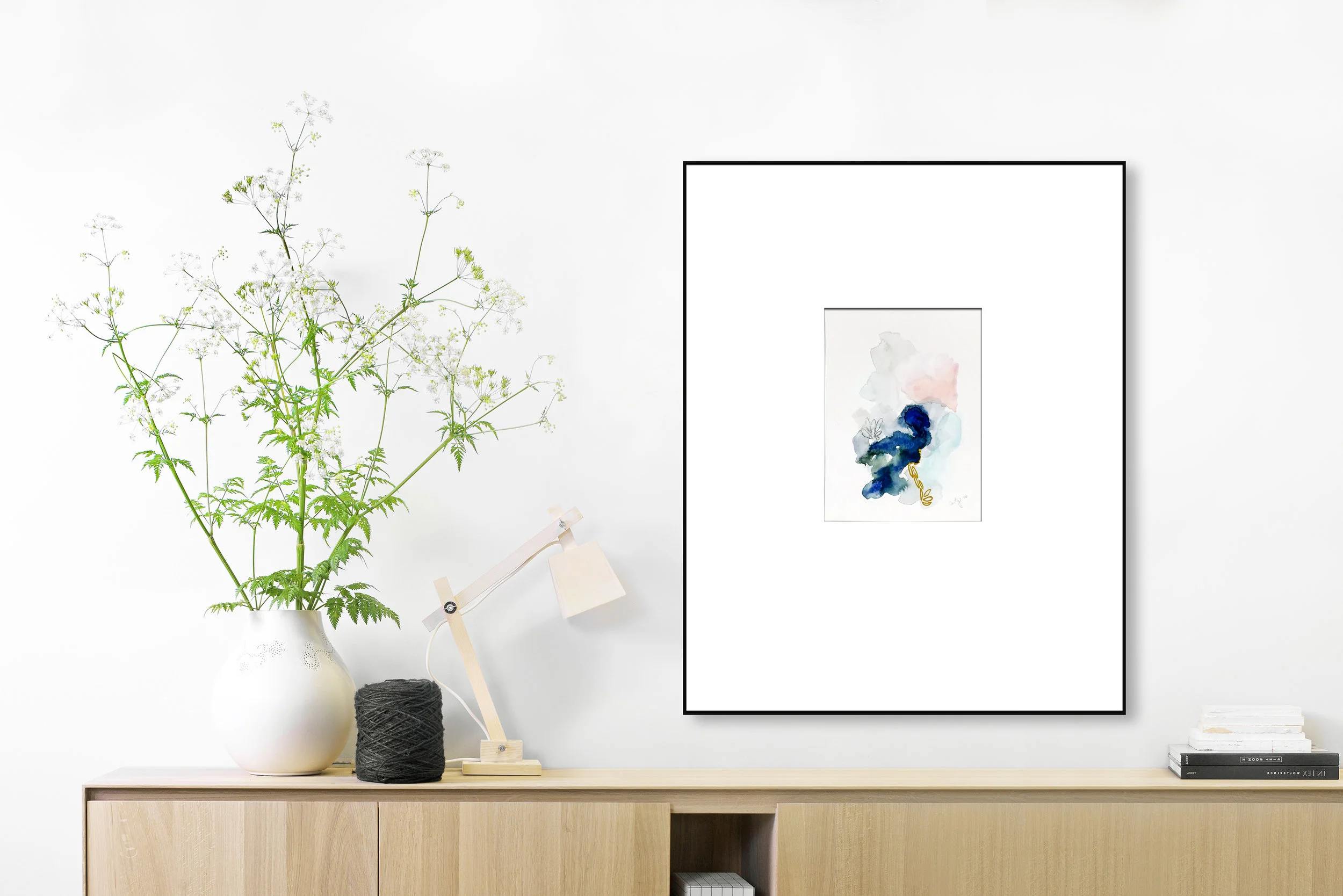 minimalist modern console table with abstract watercolor painting by megan Carty