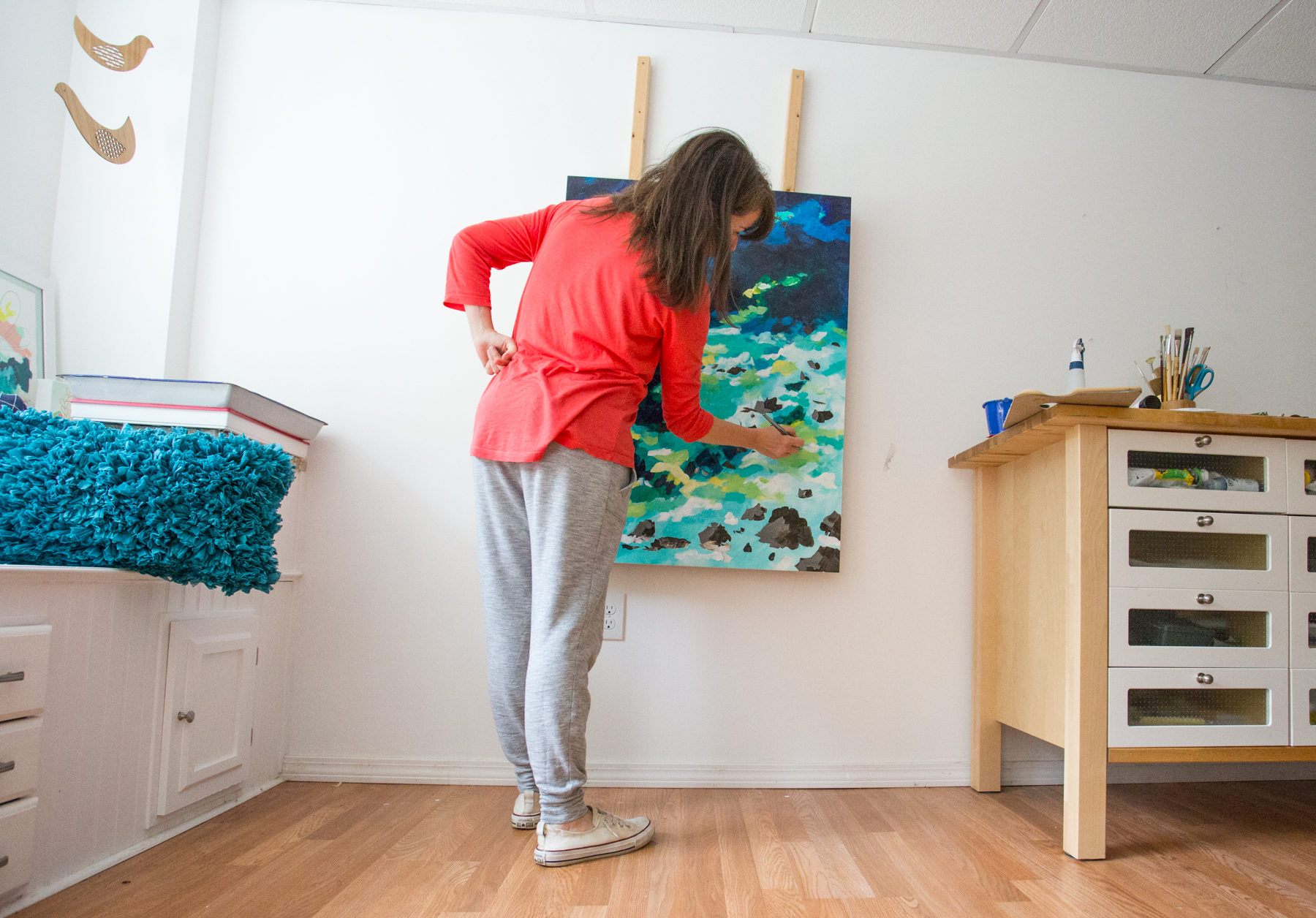 artist Megan Carty in the studio, abstract seascape painting
