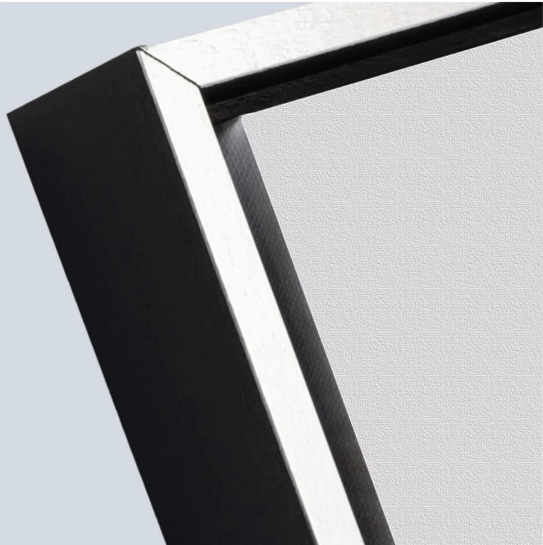 silver_black_frame_closeup_white_canvas.jpg