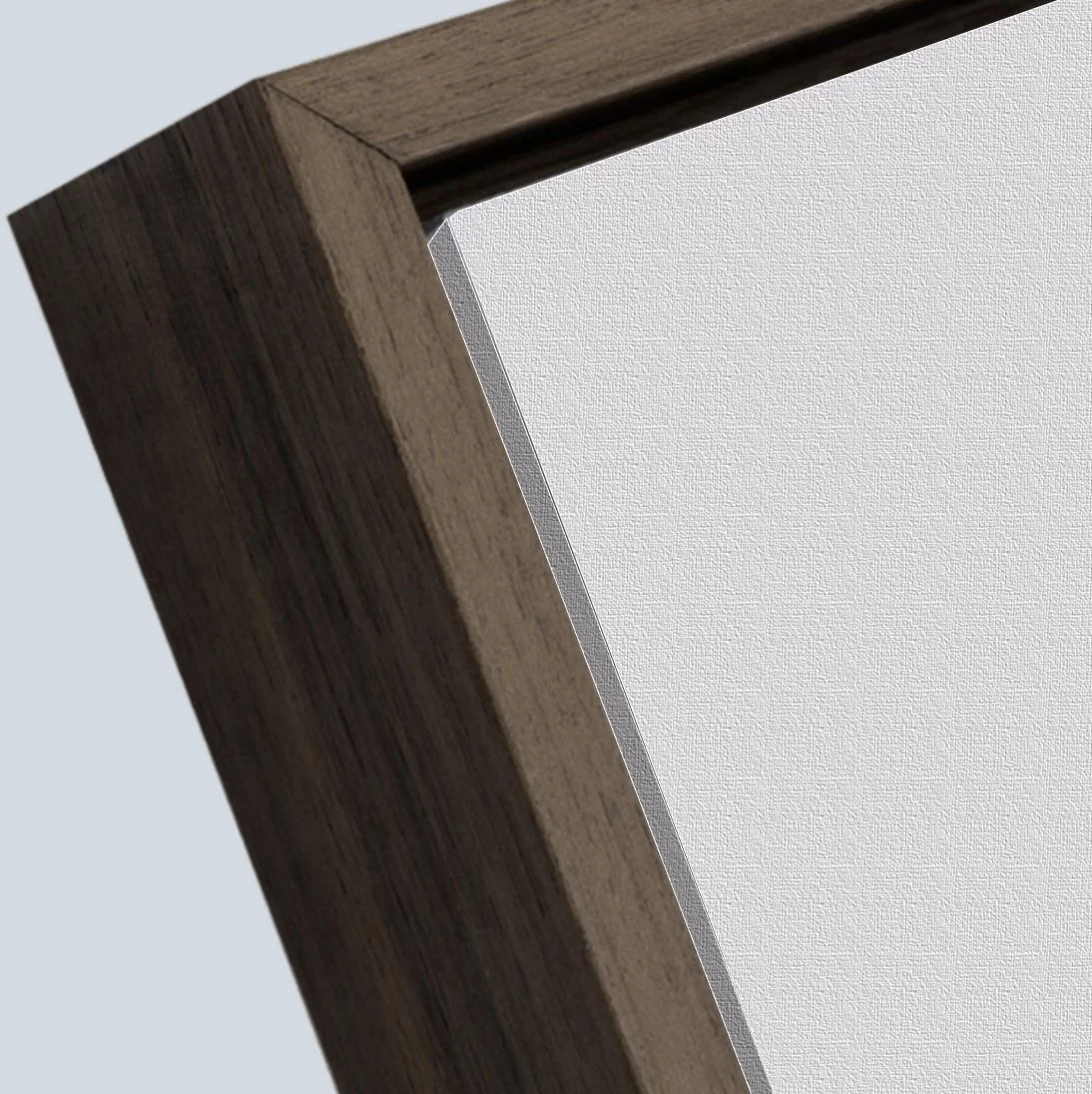 walnut_frame_closeup_white_canvas.jpg