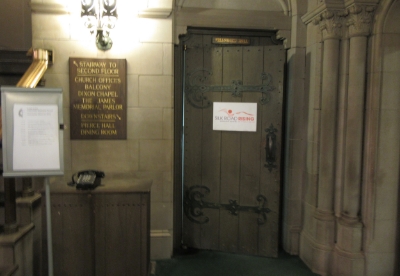 Go through this door and down the stairs.