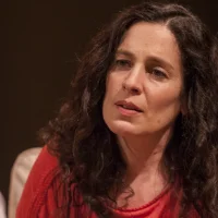Amy J. Carle as Aisha Khalil
