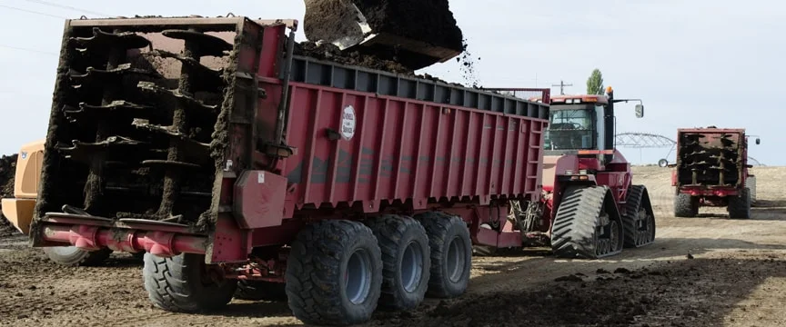 Manure, Crops, Fields, Fertilizer, Organic, Cow, Dairy, Bovine, Nutrient Management, Blending, Potting Soil, Marijuana, Weed, Growing, Peat Moss, Pumice Rock, Pomace Rock, Wood Chips, Wood Shavings, Equipment Rental. Windrow Turning, Screening, Trommel, Custom Hire, Rock Crushing, Orchards, Vineyards, Compost, Screened Manure, Soil Amendment, Organic, Orchard Application, Application, Quad Trac, Tractors, JBS, Komptech, Case, Wheel Loaders, Hauling, Distribution, Top Soil, Farming, Agriculture, Potatoes, Corn, Beans, Peas, Soil Health, Microbial Activity, PFRP, Certified for Organic Use, Tillage, No-Till. Grinding, Site Restoration, Pot-Soil, Cannabis, Yardwaste, Cowpost, Chicken Manure, Apples, Wine, Cultivating Agricultural Resources, Rental, Ovenell, 131 degrees, Construction, Erosion Control, Water Retention, Biological Activity, Green Waste, Curbside Collection, Pen Maintenance, Cattle, Organic Fertilizer, Organic Nutrients, Nutrients, Potash, Nitrogen, Cover Crop, Organic Manure, Green Manure, Banding, Broadcast 
