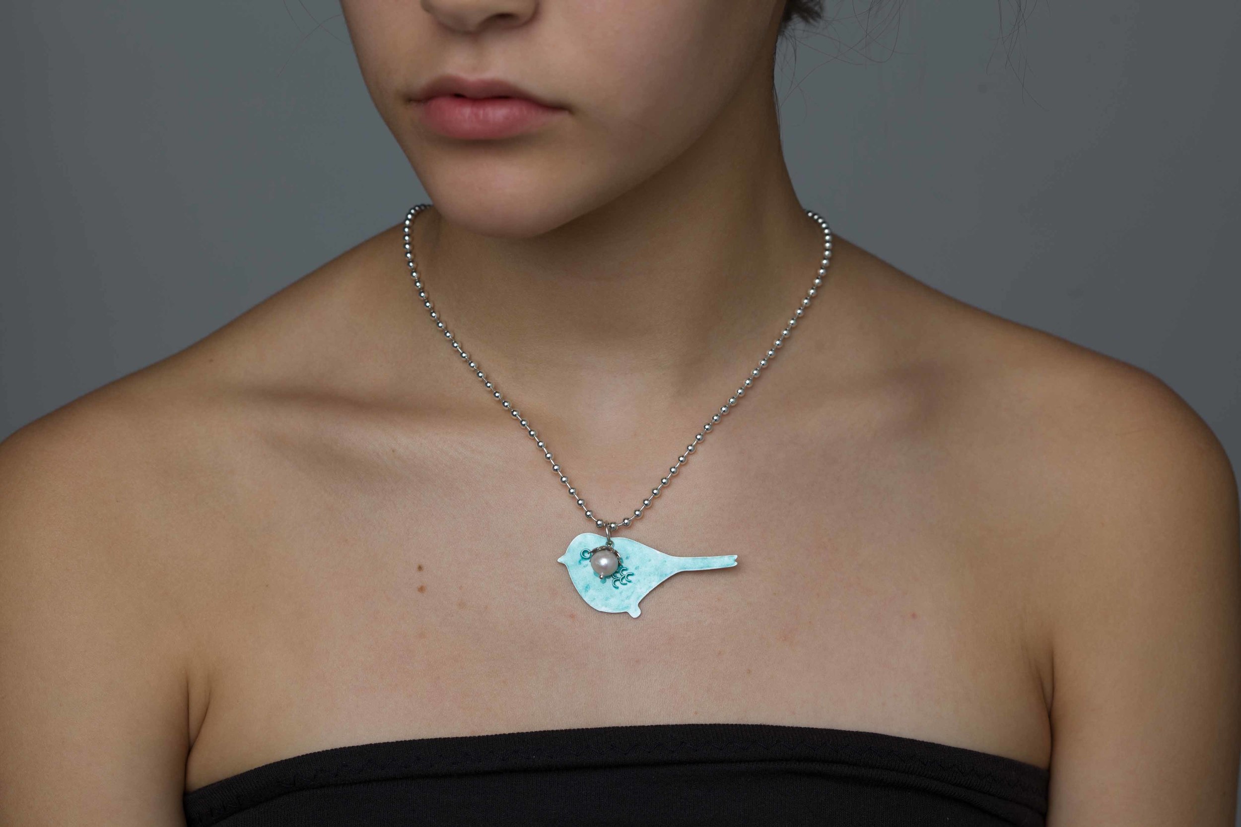 Enamel aqua blue bird pendant