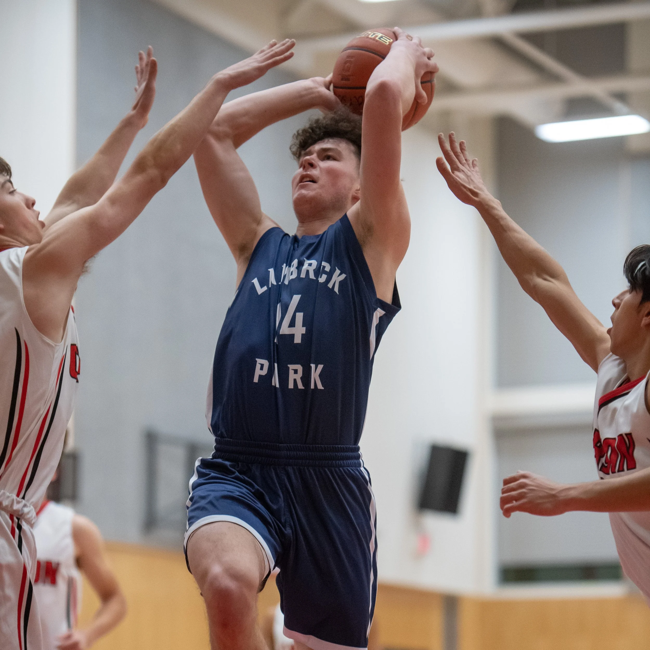 (BOYS) Friday Night Lights as Lambrick Park tops Carson Graham in Quarters