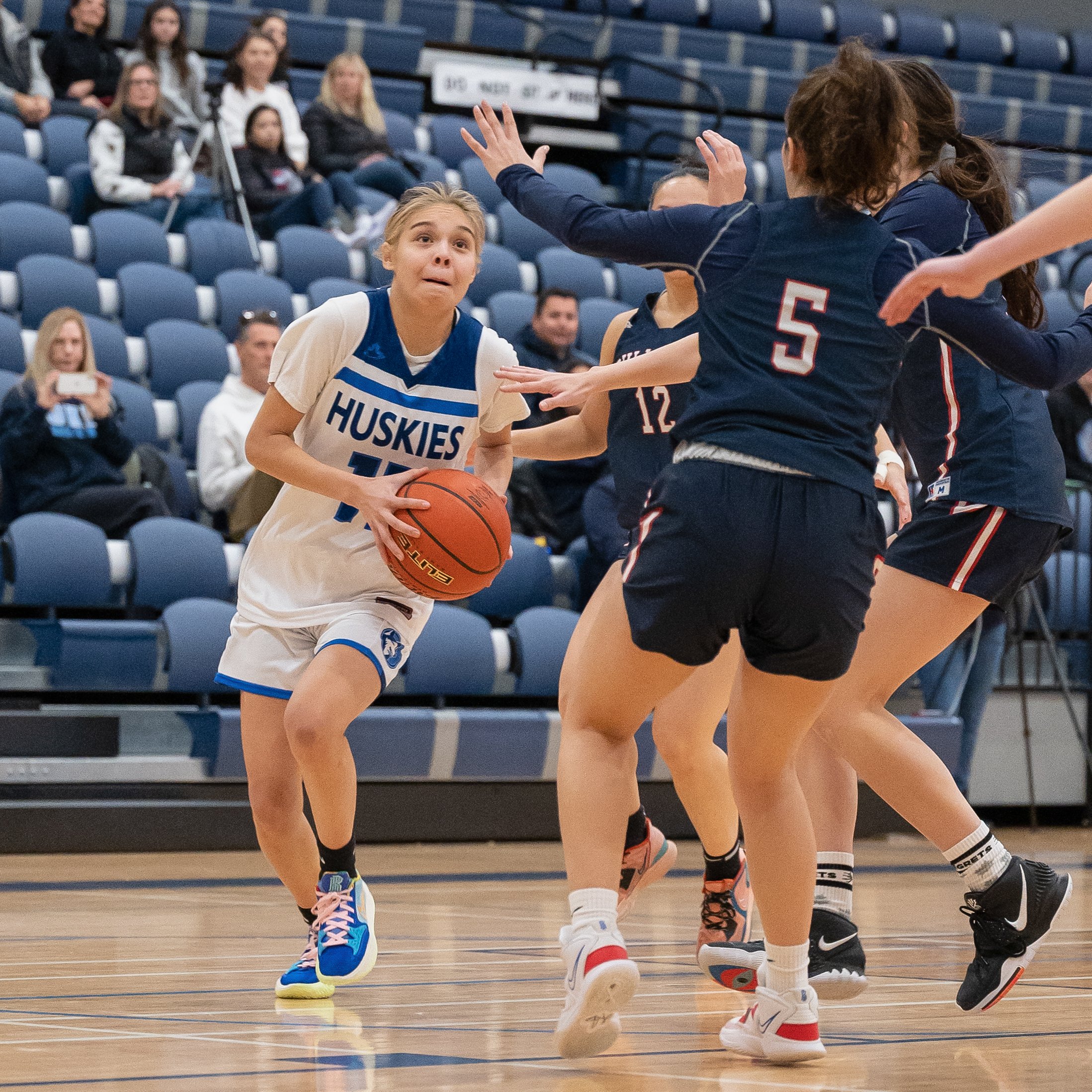 Battle of the Dogs: OKM Huskies get W Over Churchill Bulldogs