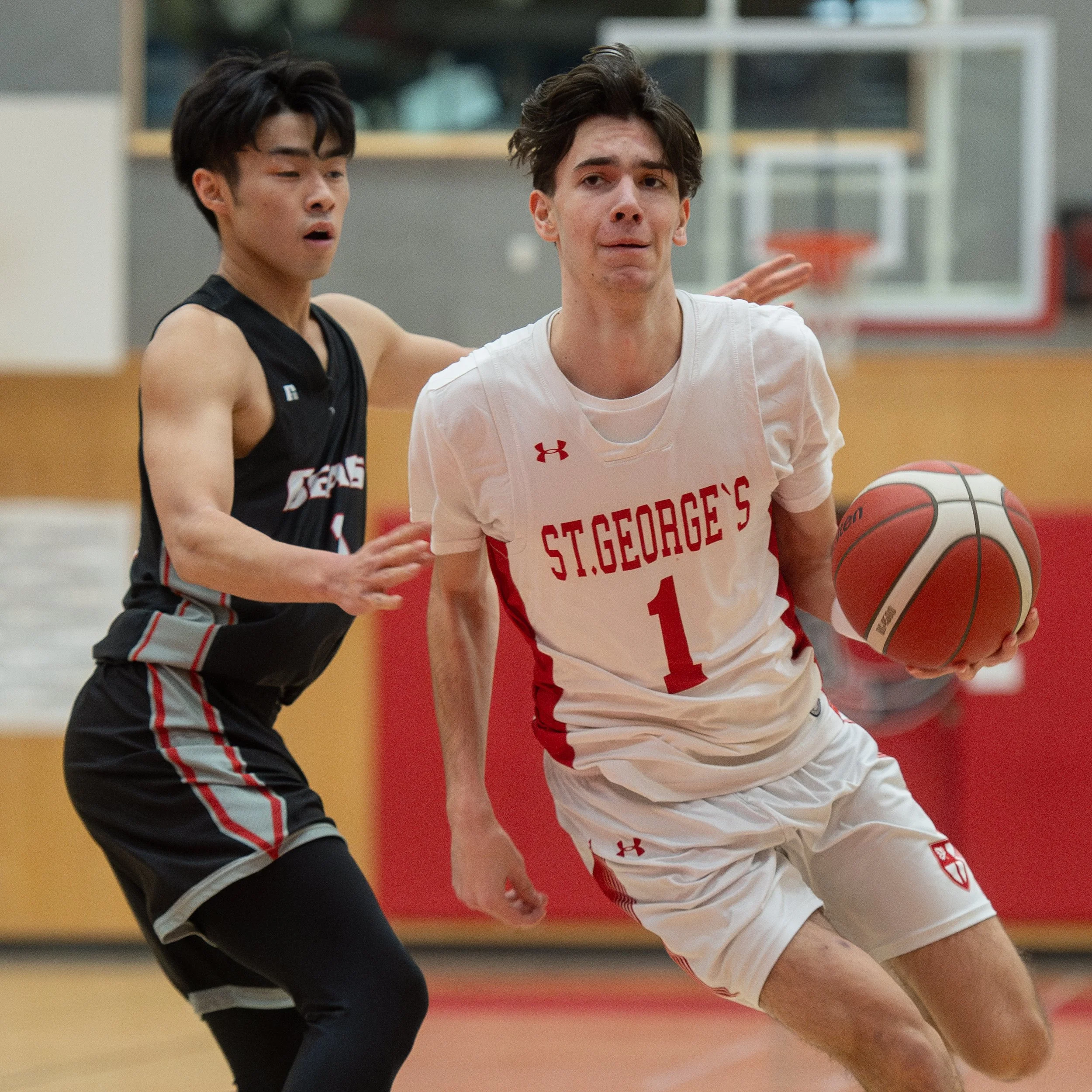 Saints Hold Court: St. George’s Finishes Day One with a Hard-Fought Victory in No Regrets Opener