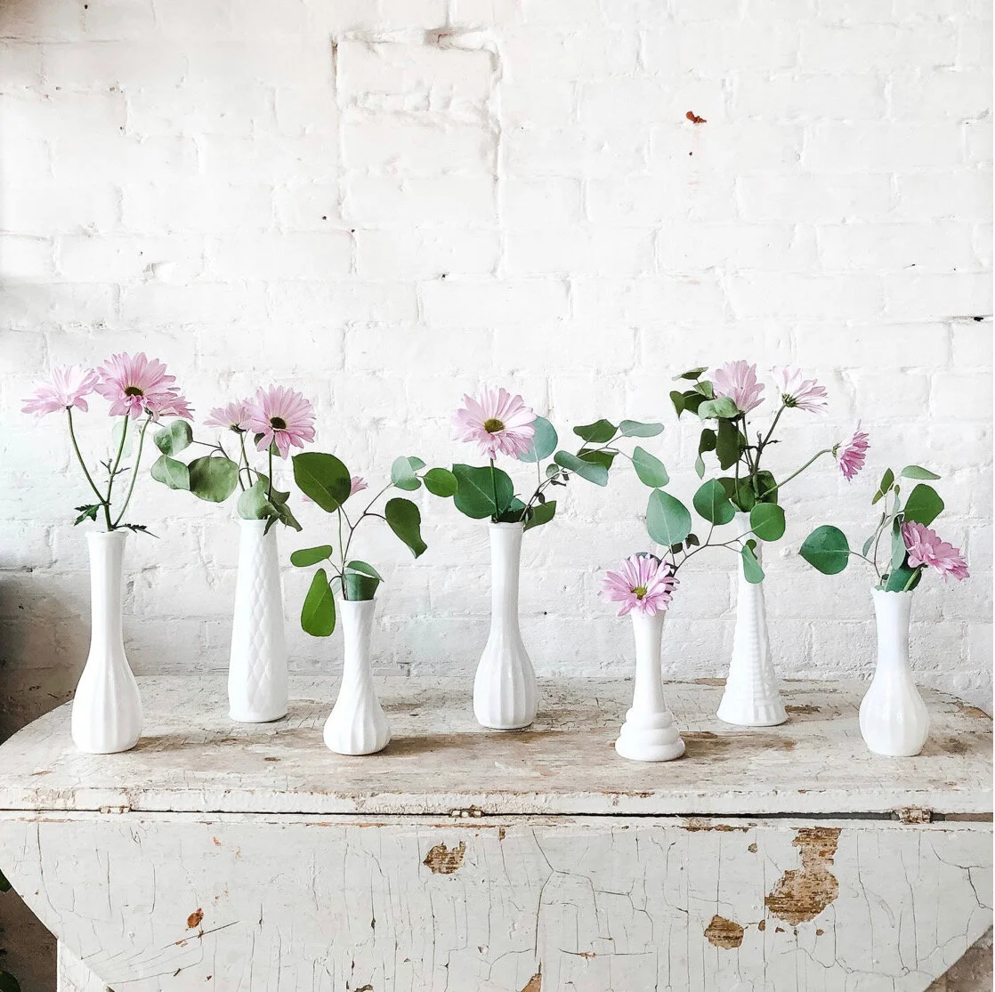 MILK GLASS BUD VASES $1