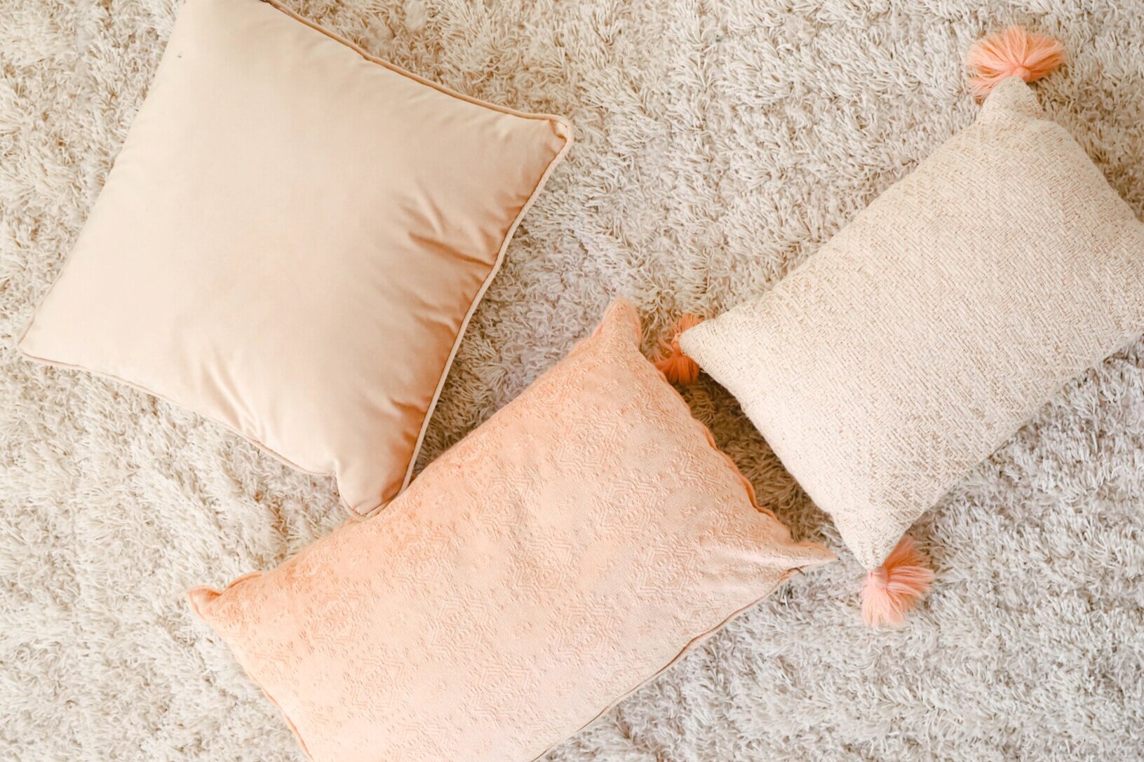 Assorted White Throw Pillows Rental