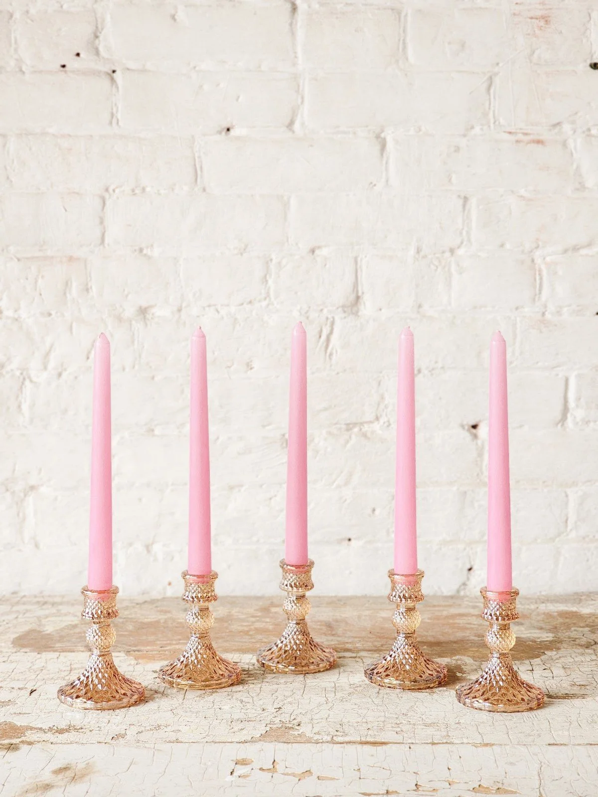 PINK TAPER CANDLES $2