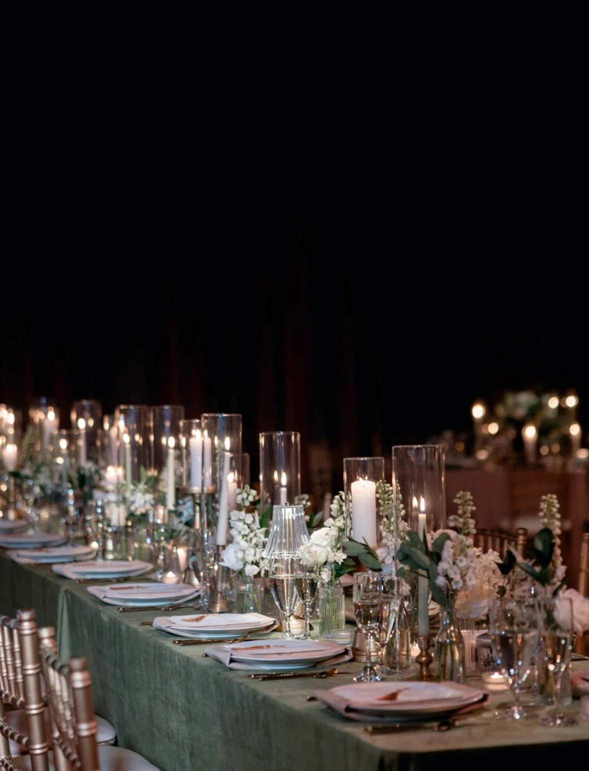 An evening set in candlelight, celebrating the  bride and groom, Kelsey &amp; Lee 🕯️🤍 
&bull;
Green tones, glowing candles, and a timeless palette we&rsquo;re loving 🥂✨
&bull;
Our Vendors✨
Photography: @brittanyboote 
Planner: @briggsandcoevents 
