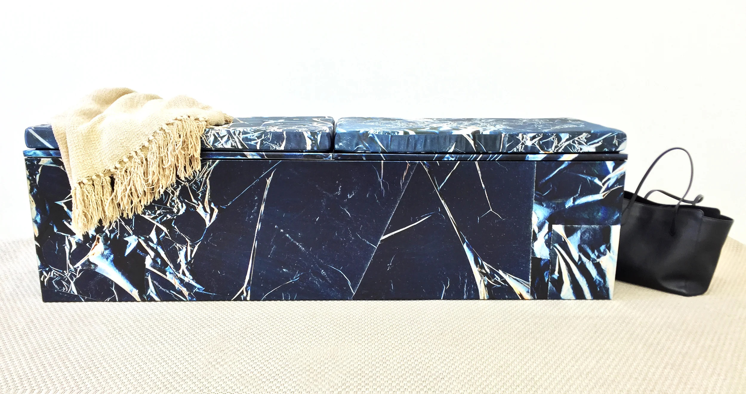 Plated custom storage bench. Top cushions in matching textile. 