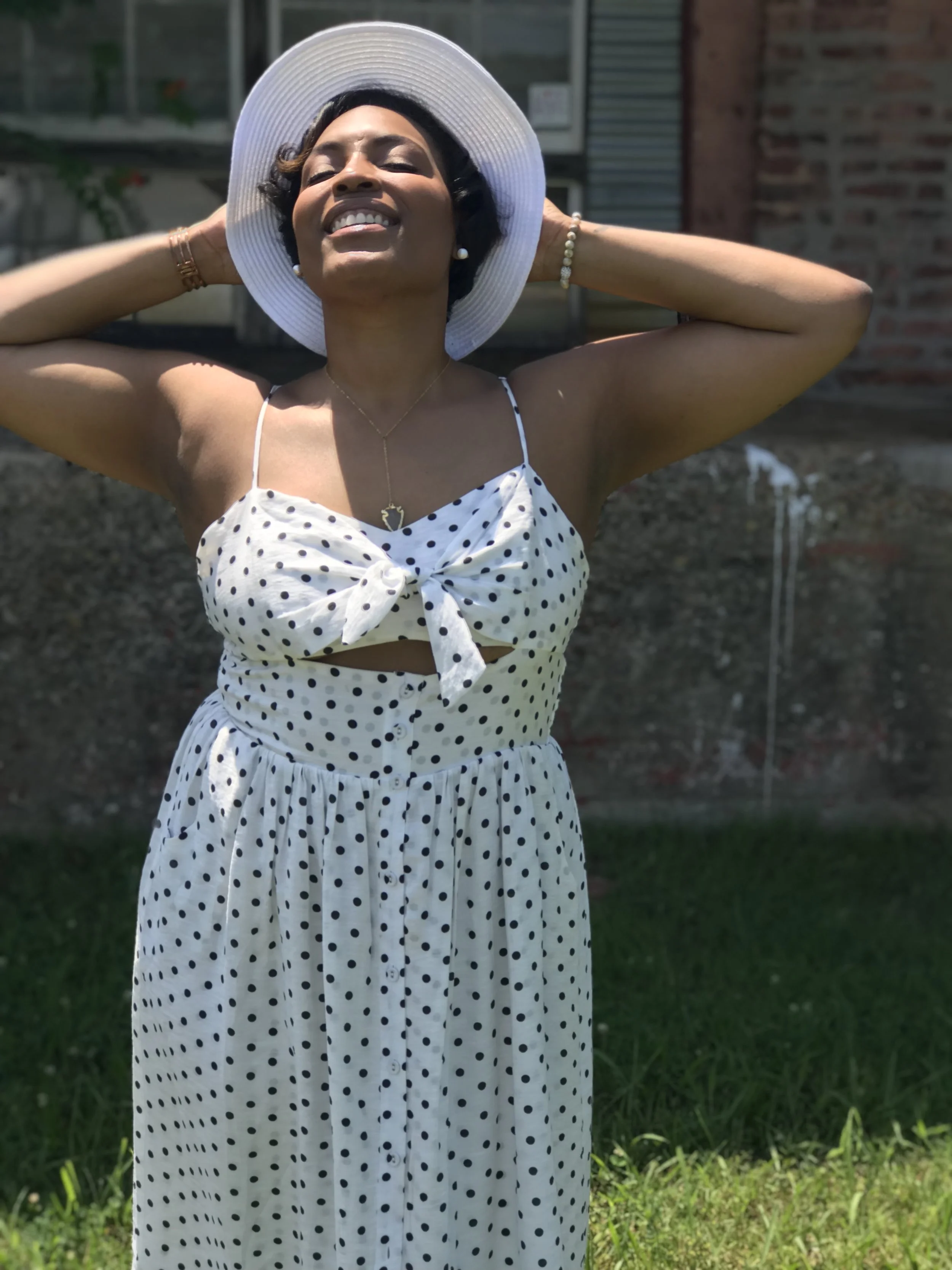 Jada Monica Drew in white dress and hat with poke dots .jpg