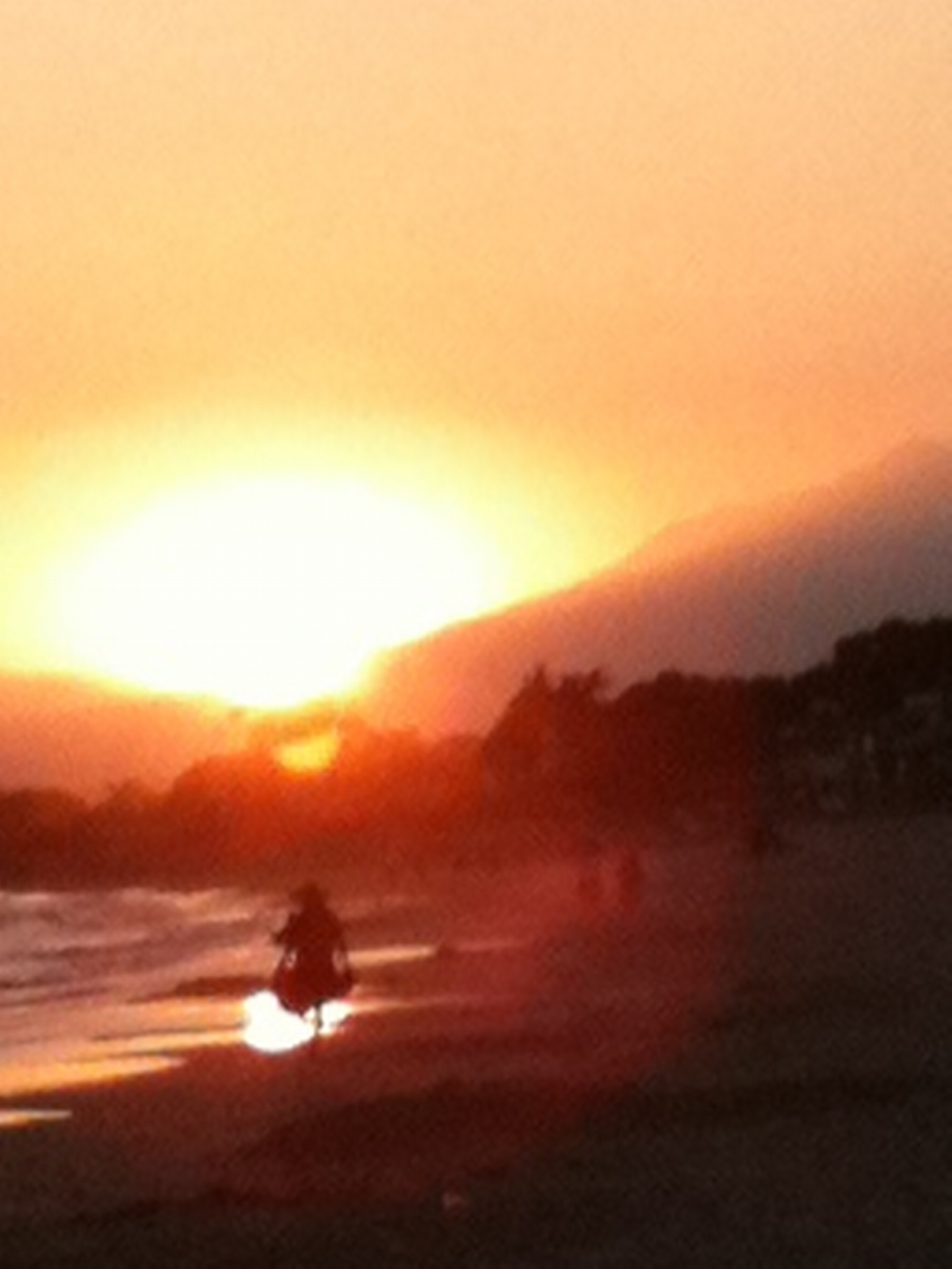 Girl-Running-on-Beach-in-Sunset-at-Carp.png