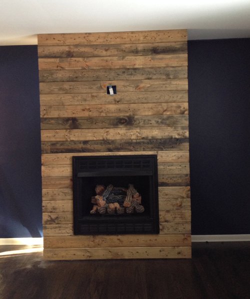 How to create a DIY reclaimed wood fireplace surround for less than $100 —  Grand Rapids Interior Design | Fuchsia Design