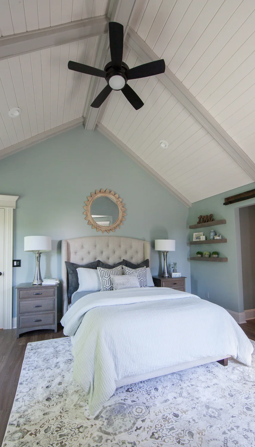 The style of this family's home is comfortable yet traditional, so we kept with a calming palette of ivory, blue, green, and warm brown. By incorporating eclectic artwork, mixed patterns and wood tones, and accessories, it gave the space a comfortable vibe that matches the rest of the home. 