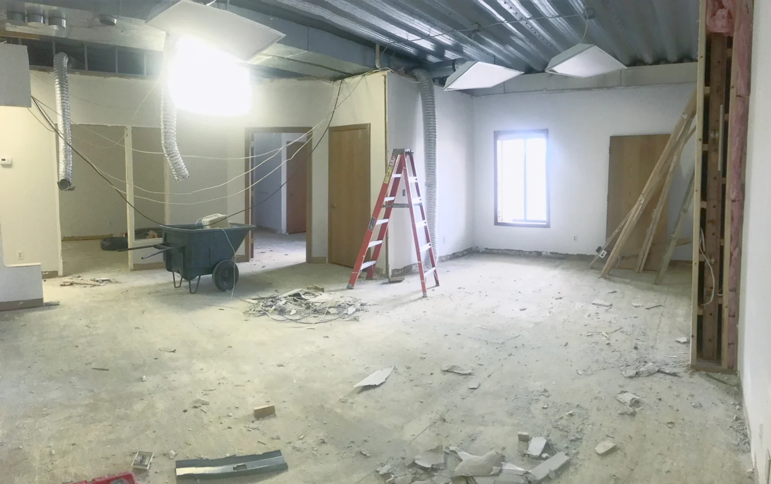 TIMBER! Walls down and drop ceiling out. 