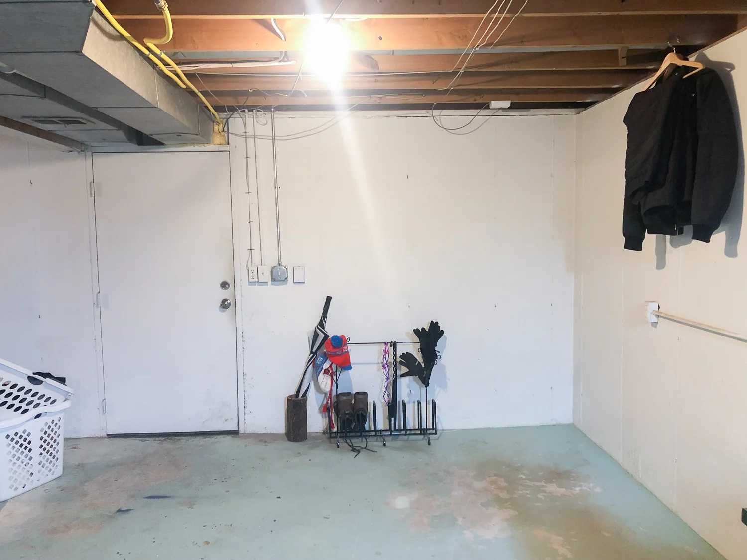 The bottom of the ‘U’ shaped room - the entrance into the garage and the wall that would soon become the mudroom