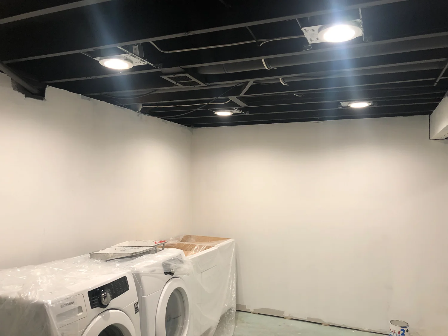 Hallelujah! The can lighting made this room start to feel like a room and less like a dungeon.