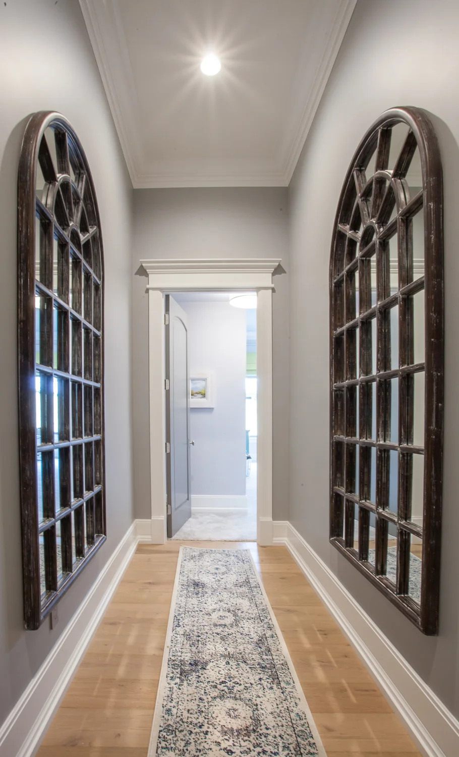 Coventry Gray is a great selection for this space because it contrasts nicely with the white trim but it’s light enough that this hallway doesn’t feel dark.