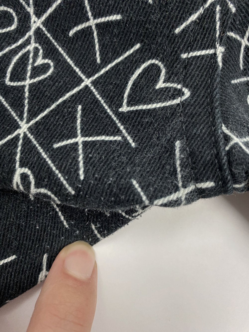 Moschino 90s tic tac toe print jeans — JAMES VELORIA