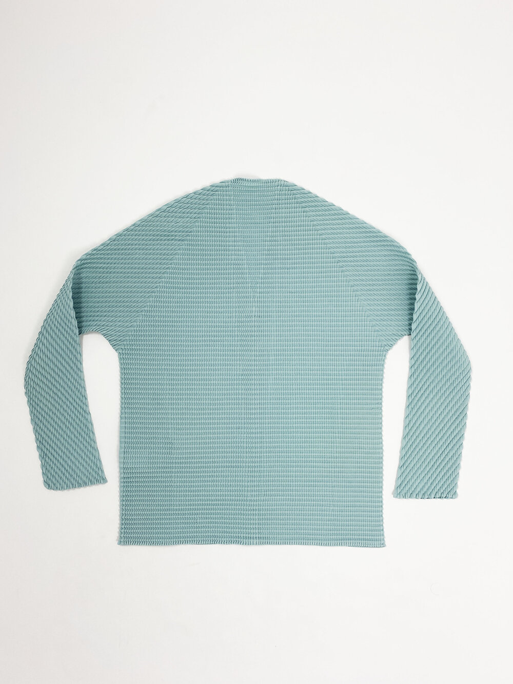 Issey Miyake mint green pleated top — JAMES VELORIA