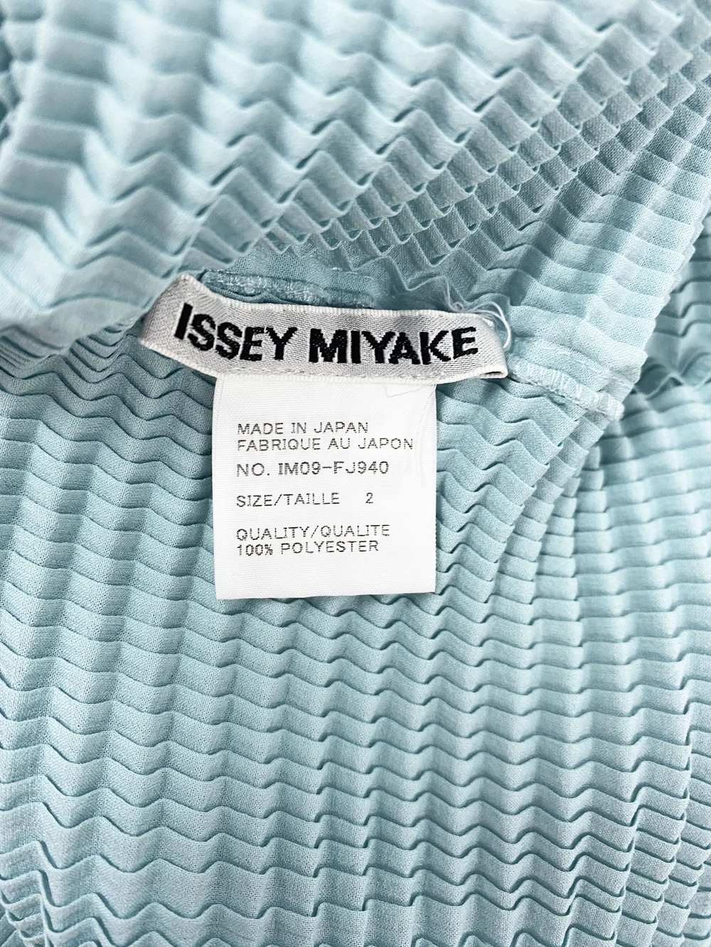 Issey Miyake mint green pleated top — JAMES VELORIA