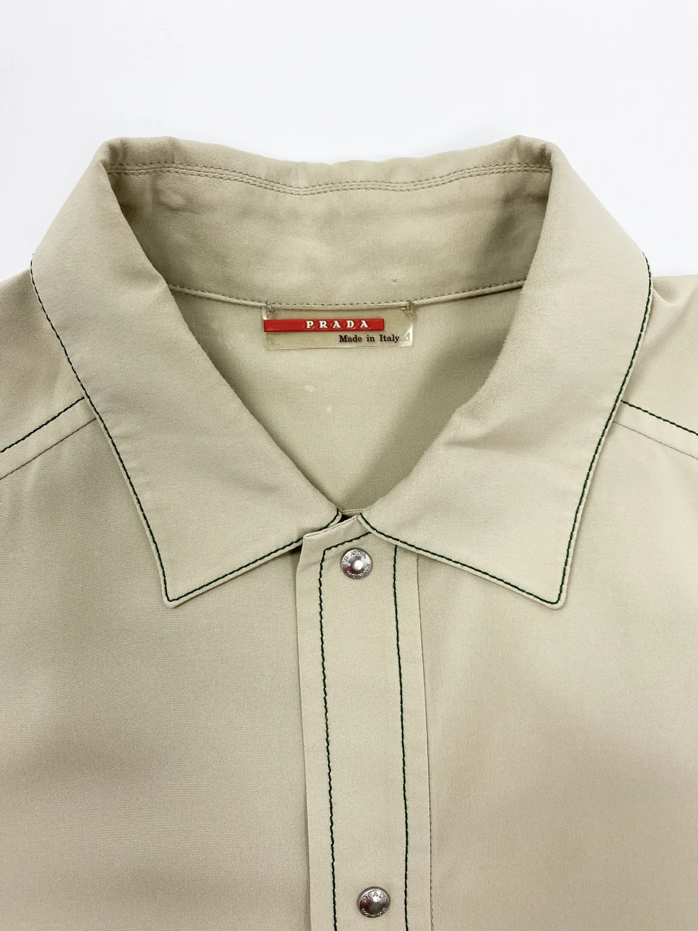 Prada Sport tan snap shirt — JAMES VELORIA