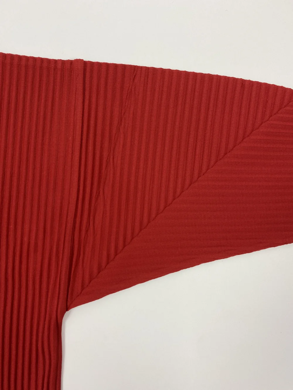 Issey Miyake Homme Plisse red pleated top — JAMES VELORIA