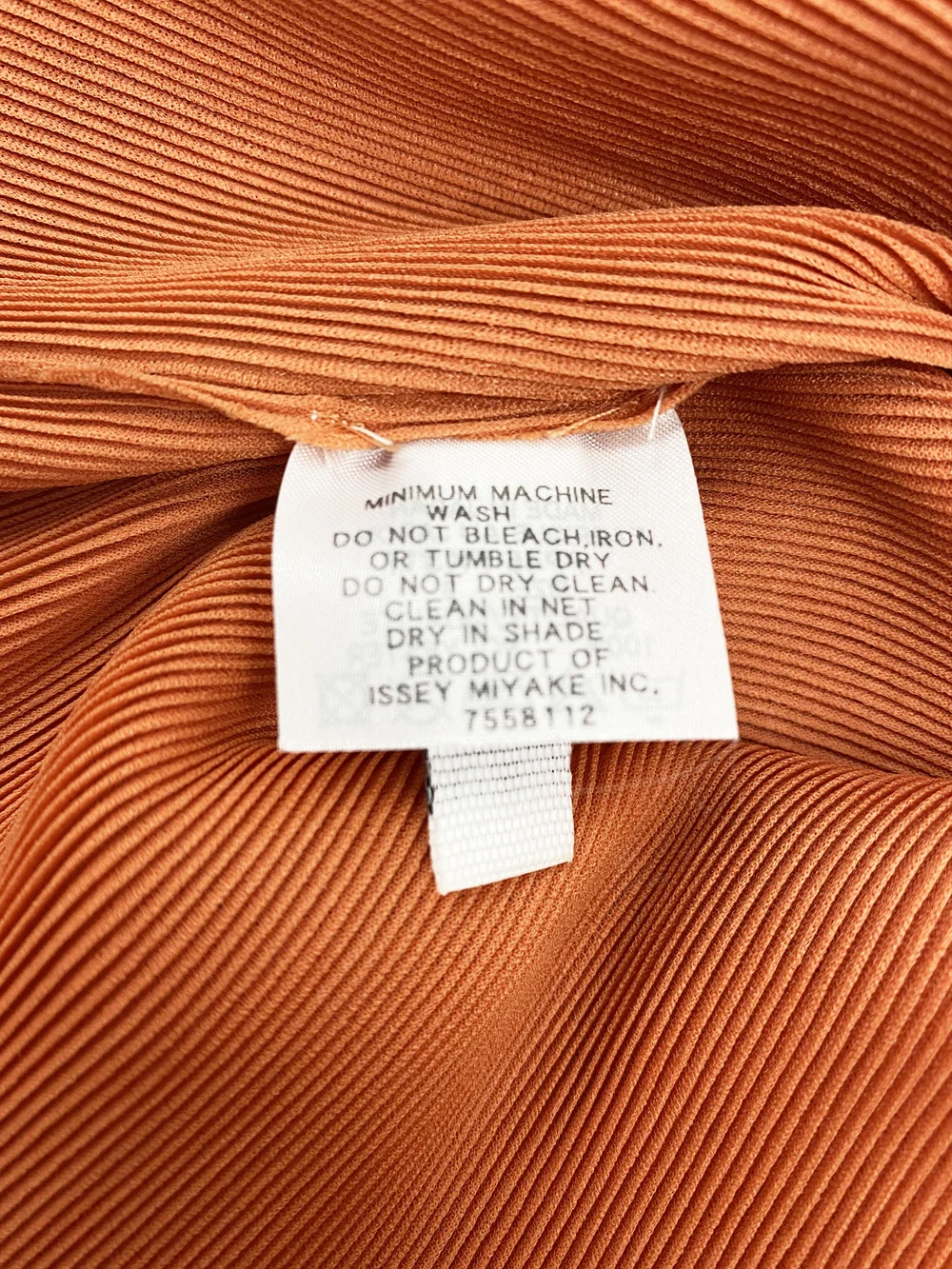 Pleats Please orange pleated top — JAMES VELORIA