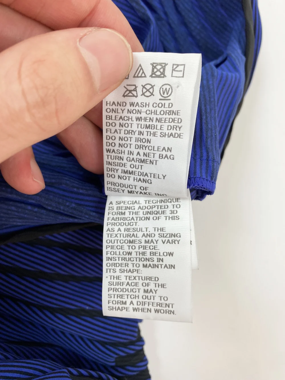 Issey Miyake blue wave pleated top — JAMES VELORIA