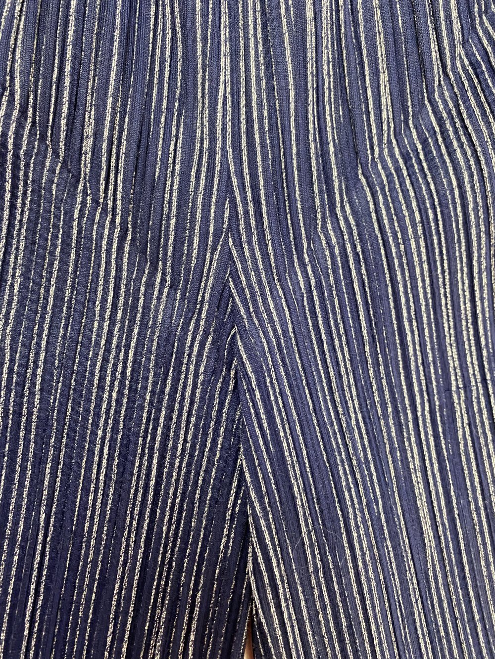 Pleats Please navy blue pleated pants — JAMES VELORIA