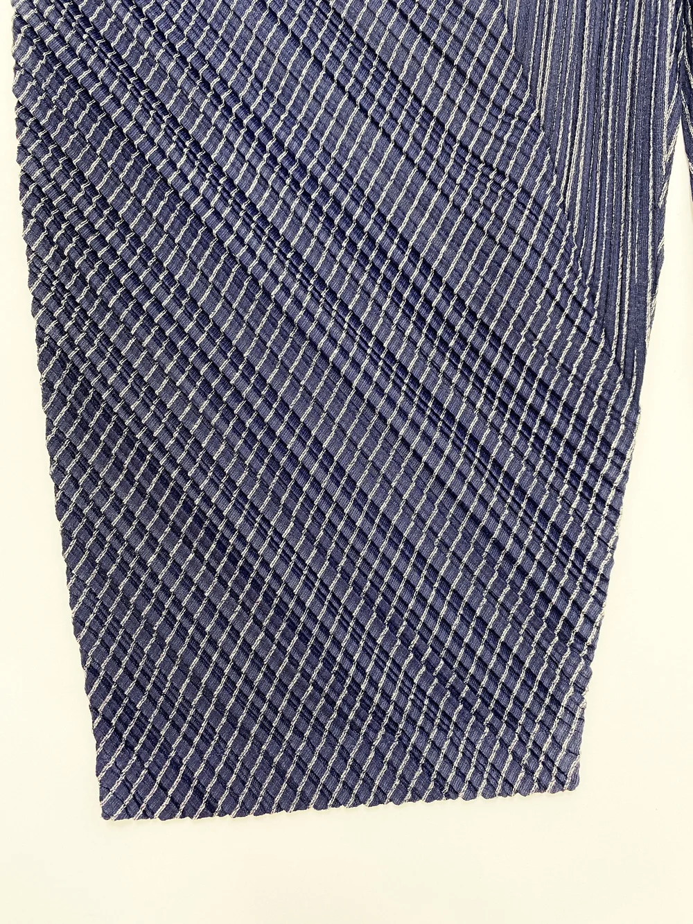 Pleats Please navy blue pleated pants — JAMES VELORIA