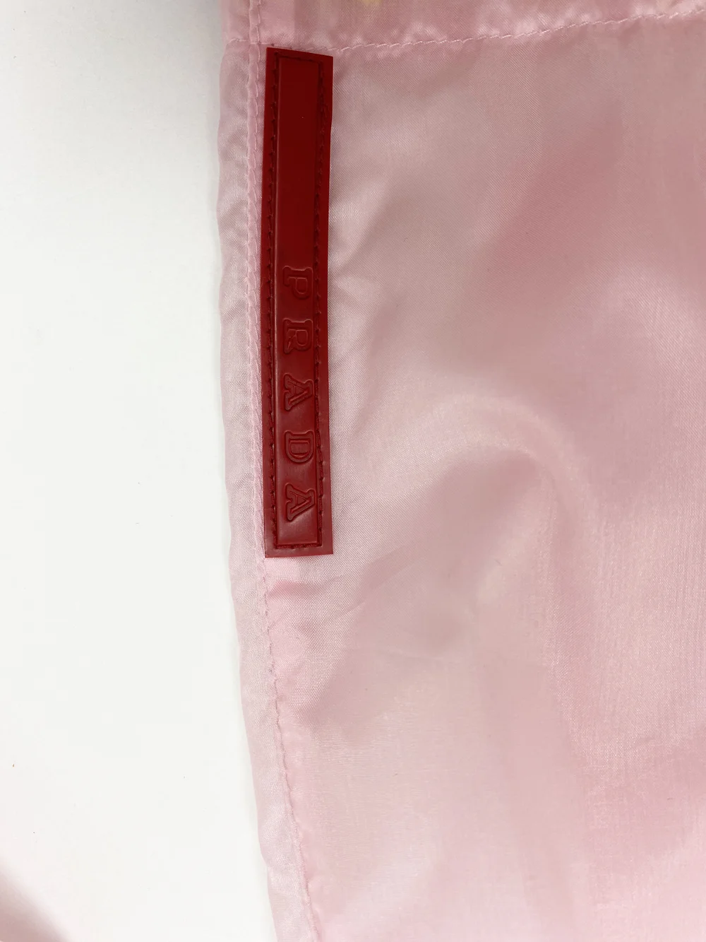 Prada Sport pink nylon convertible jacket — JAMES VELORIA
