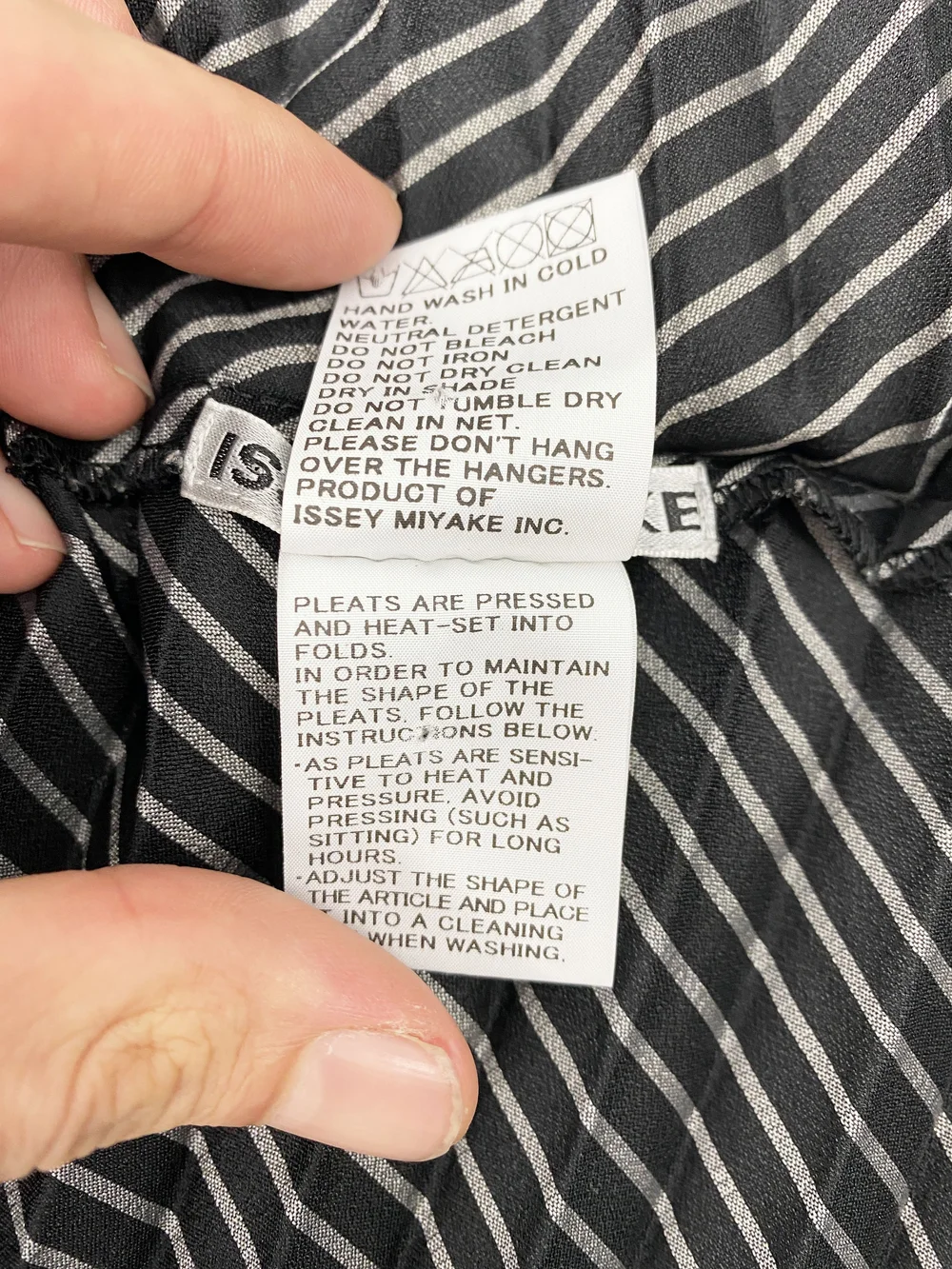 Issey Miyake swirl pleated striped jacket — JAMES VELORIA